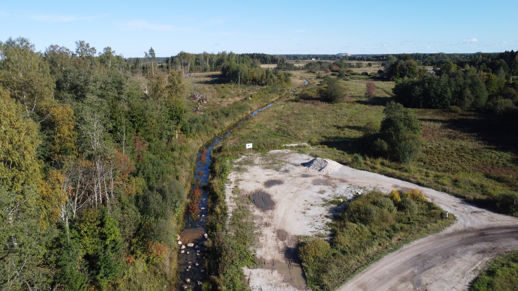 Aerial view of the Estonian peatlands, where the lab tracks a decades-old environmental release.